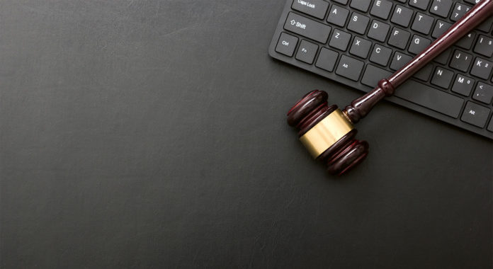 Virtuell Gerichtsverfahren, Foto: AdobeStock/Roman Motizov